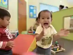 Infant play yard with foam padding at Garden Grove Montessori