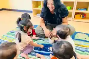 OC Kids dedicated preschool teachers with students