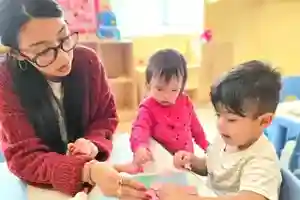 Toddler play yard with foam padding at Garden Grove Montessori