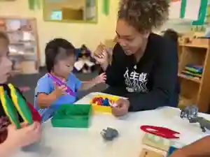 Junior Pre-K children singing and doing crafts at OC Kids