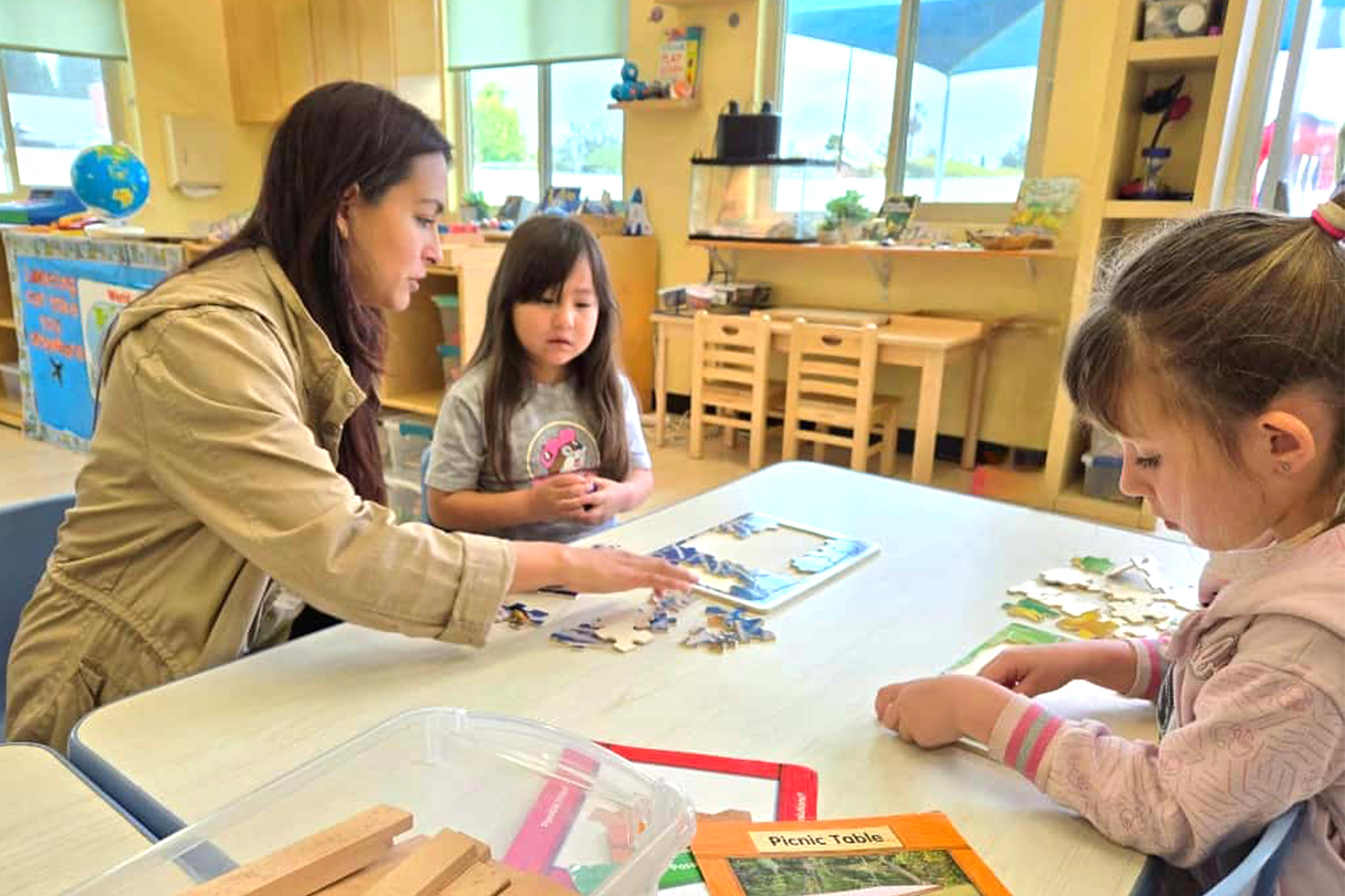 Teachers and staff in Anaheim Preschool guiding classroom learning