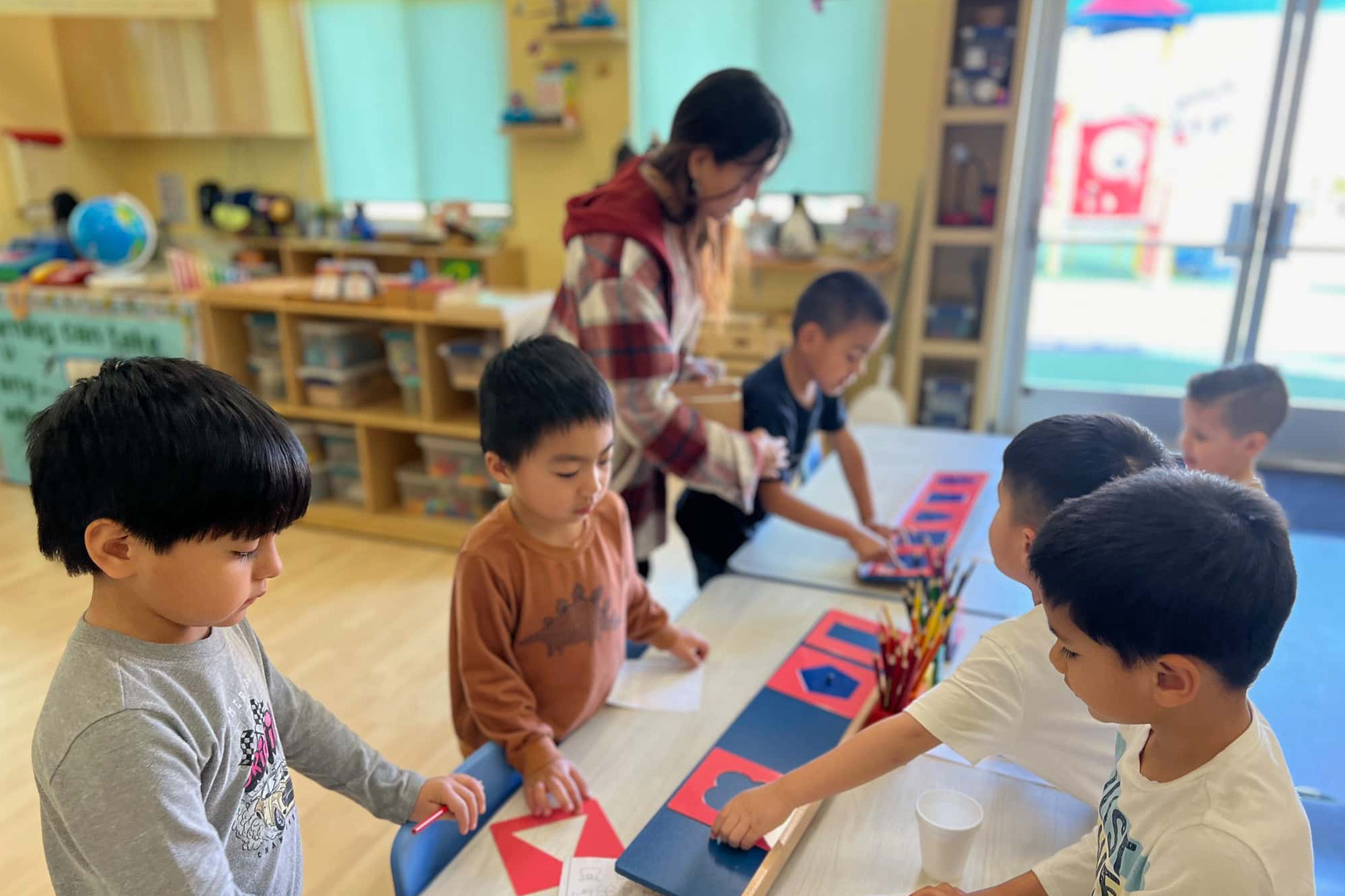 Transitional Kindergarten students engaged in learning activities at Preschool Anaheim